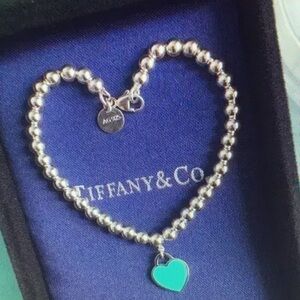 Tiffany & Co Silver Beaded Bracelet with Blue Heart Charm
